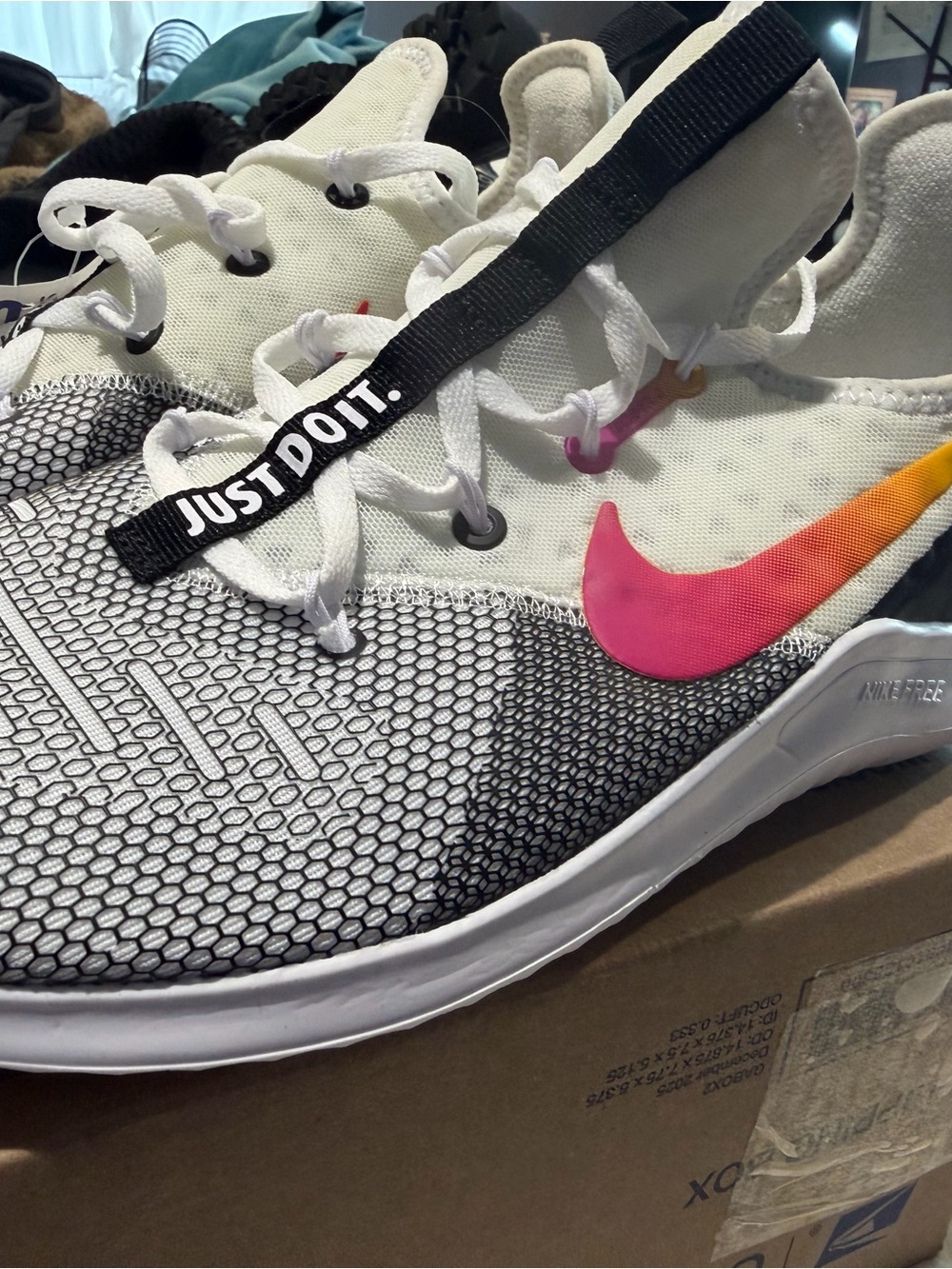 Nike Women’s White Sneakers with Pink-to-Orange Gradient Swoosh